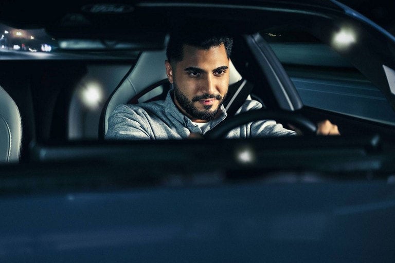 Person sitting in the driver’s seat of a parked 2024 Ford Mustang® coupe | Ed Morse Ford Lebanon in Lebanon MO