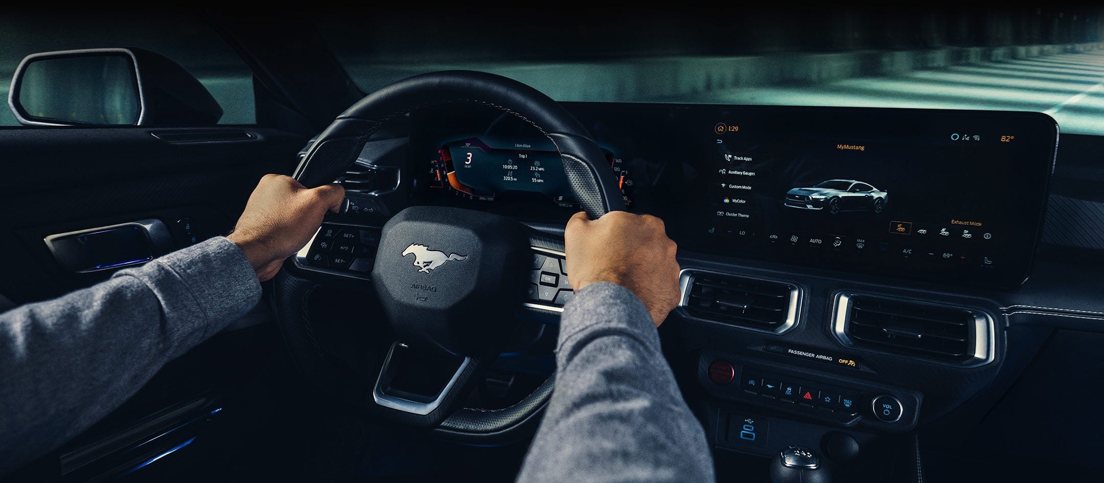 A 2024 Ford Mustang® model interior with a person driving | Ed Morse Ford Lebanon in Lebanon MO